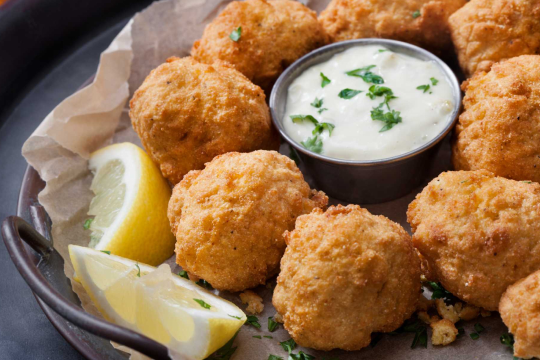 Delicious Hush Puppies, freshly cooked and served piping hot, embodying the essence of comfort food.